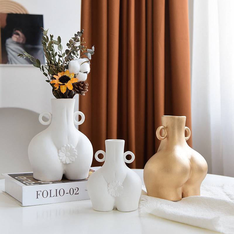 Enhance your living room with simple ceramic vases, perfect for flower arrangements. Stylish home furnishings to elevate any space with elegance and charm.