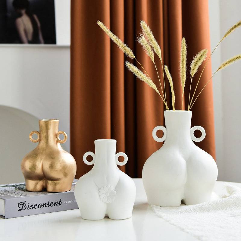 Enhance your living room with simple ceramic vases, perfect for flower arrangements. Stylish home furnishings to elevate any space with elegance and charm.